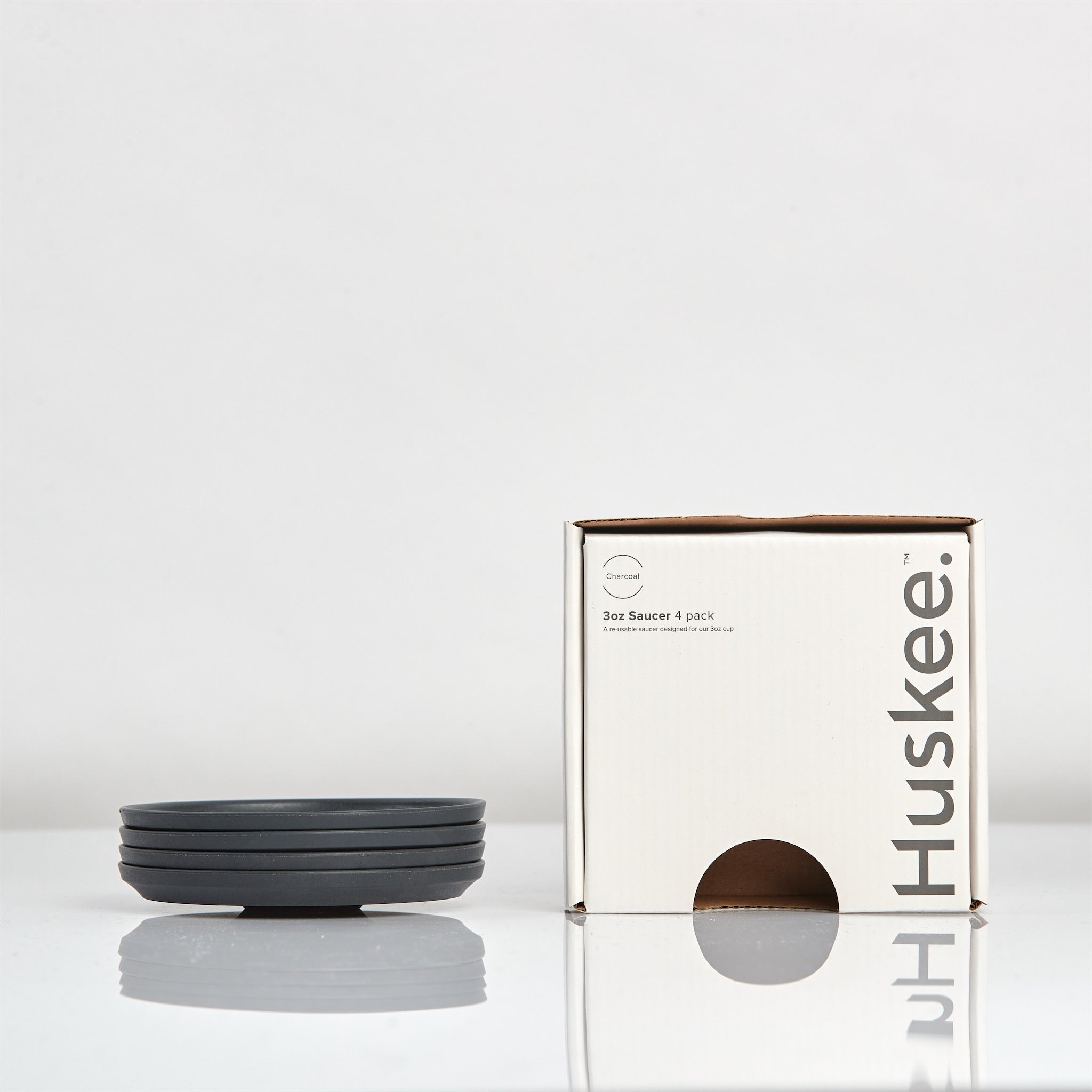 HC3SC04-E - 3oz Espresso HuskeeCup Saucer 4-pack Charcoal / A1