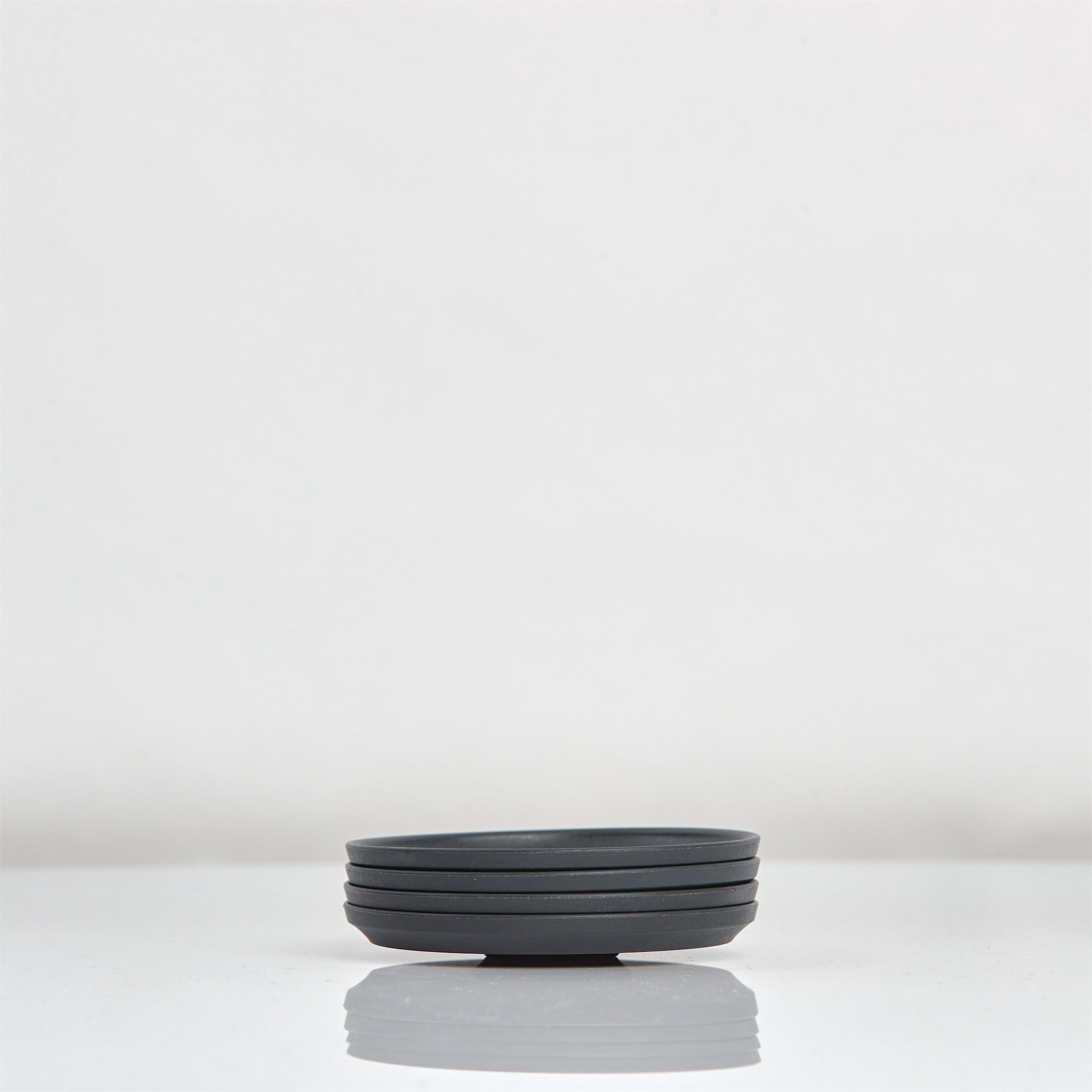 HC3SC04-E - 3oz Espresso HuskeeCup Saucer 4-pack Charcoal / A1